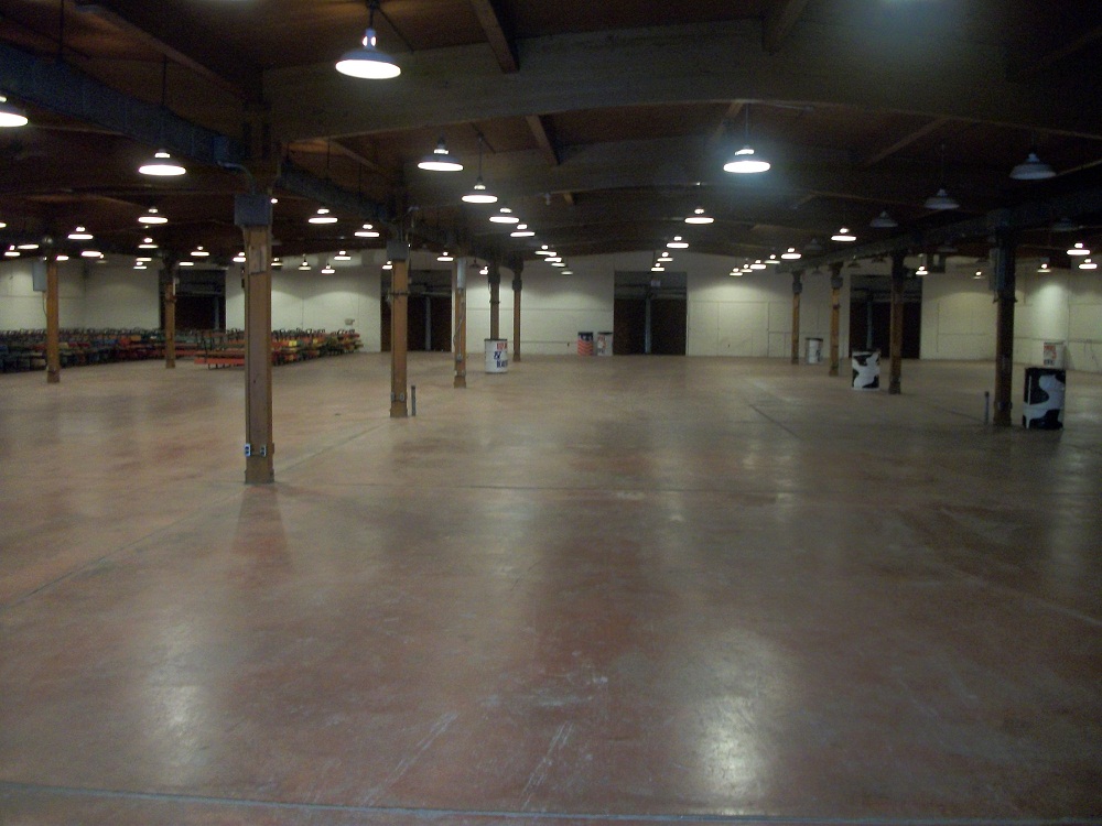 Interior photo of the Family Living Center empty, with lights. 